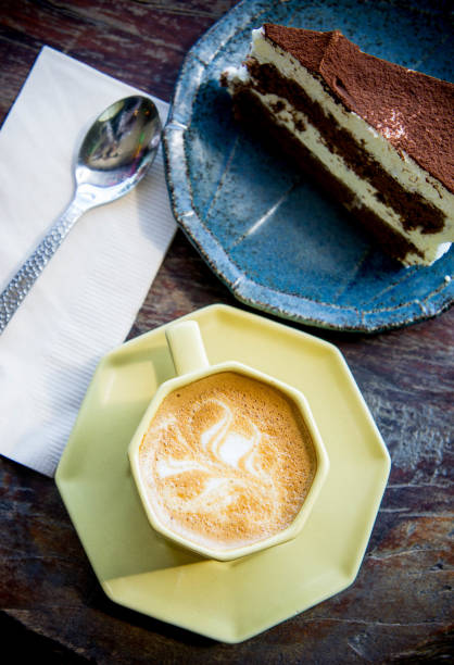 istock coffee cup and Chocolate cake in coffee shop 640107236