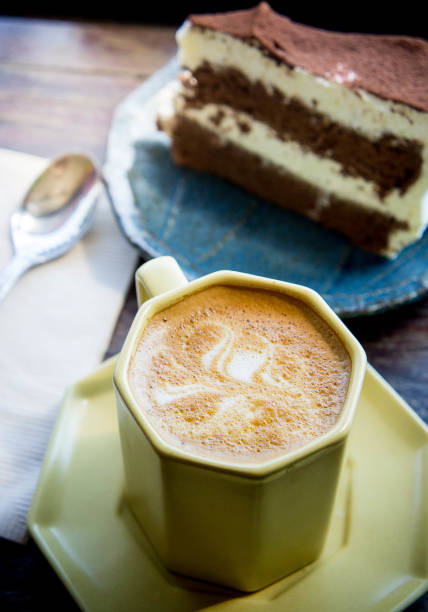 istock coffee cup and Chocolate cake in coffee shop 640107304