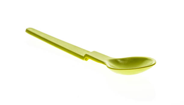 istock Close-up of a plastic tableware spoon for babies and children. 640109116