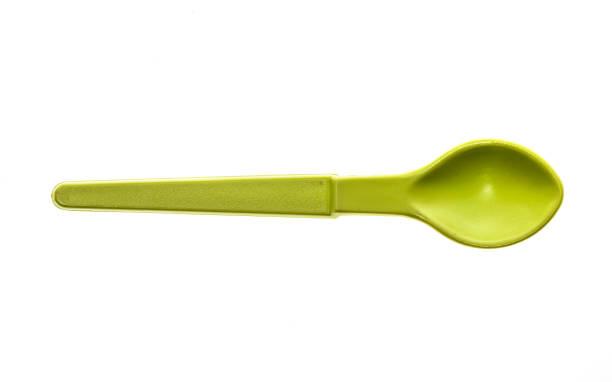 istock Close-up of a plastic tableware spoon for babies and children. 640109130