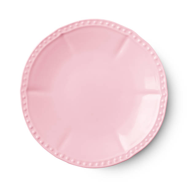 Simple pink circular porcelain plate with clipping path