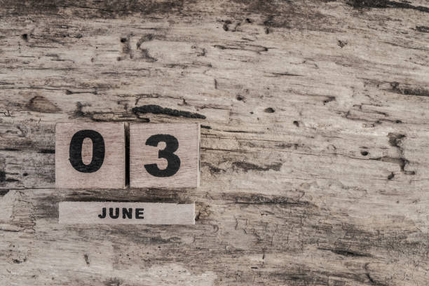 istock Cube calendar for june on wooden background 640109656