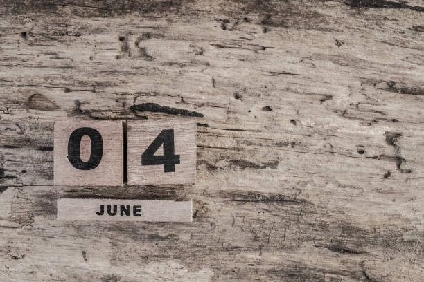 istock Cube calendar for june on wooden background 640109762