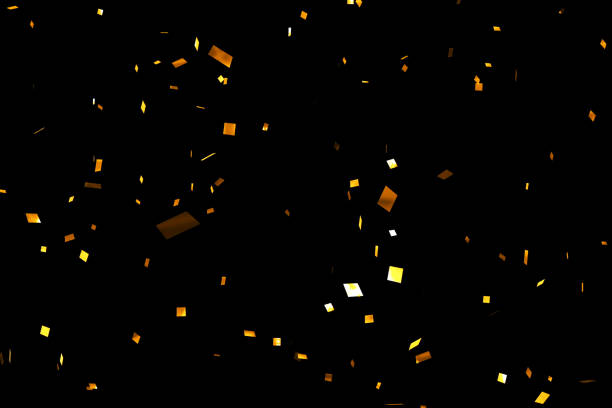 istock falling golden metallic glitter foil confetti on black background 640110012