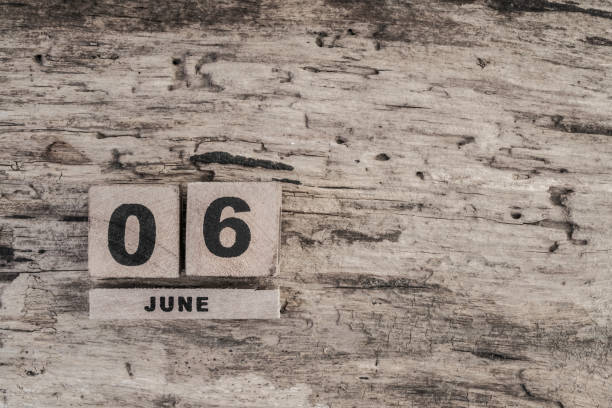 istock Cube calendar for june on wooden background 640110038