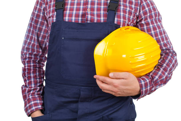 istock Young male engineer holding his helmet 640110086