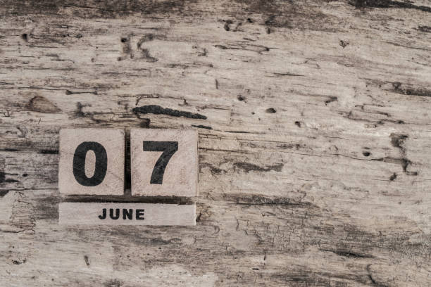 istock Cube calendar for june on wooden background 640110248