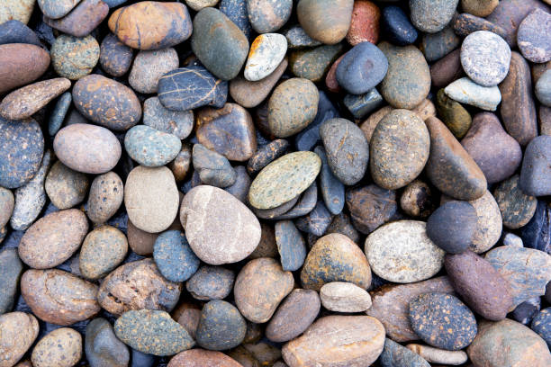 Photo of Pebbles background.Gravel background.Colorful pebbles background