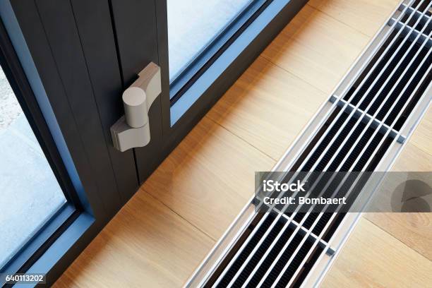 Heating Grid With Ventilation By The Floor Stock Photo - Download Image Now - Air Duct, Radiator - Heater, Flooring