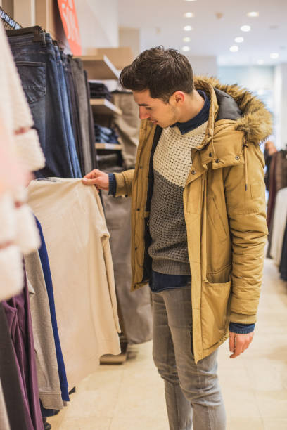istock Man shopping for shirt 640115198