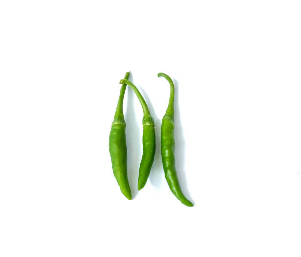 istock green chilly peppers isolated, white background 640116772