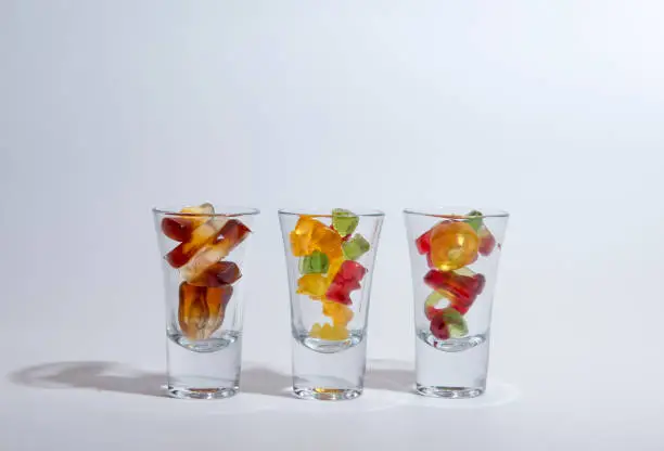 Photo of Gummy sweets in glasses.