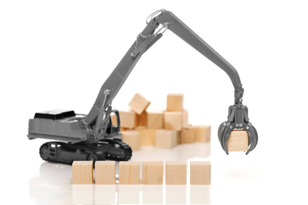 istock Crane and blank wooden  cubes 640121212