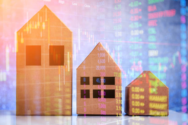 istock house in brown recycled paper on white floor 640121338