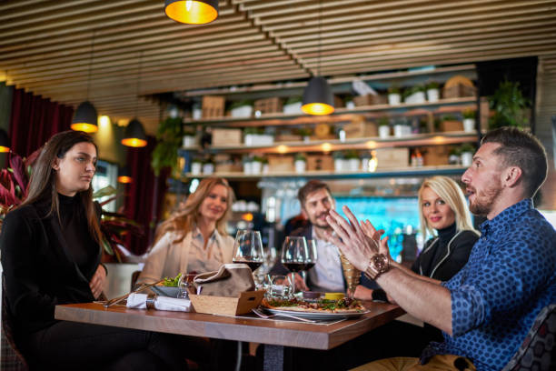 istock People having fun in the restaurant 640121416