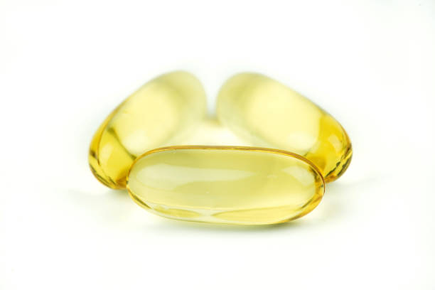 istock Fish oil capsule isolated on white background. 640121418