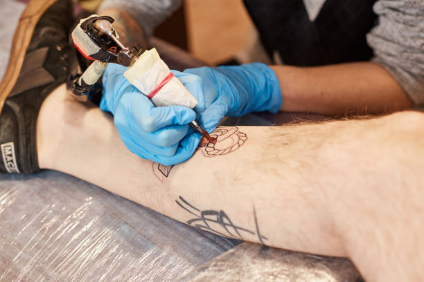 istock Tattoo artist is making 640126960