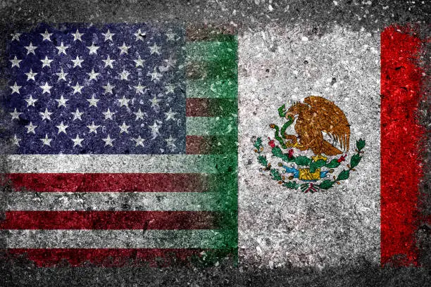 Photo of Merged Flags of USA and Mexico Painted on Concrete Wall