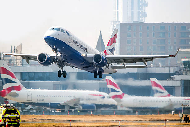 British Airways flight takes off from London City Airport London, UK - September 15, 2016: British Airways flight takes off from London City Airport british airways stock pictures, royalty-free photos & images