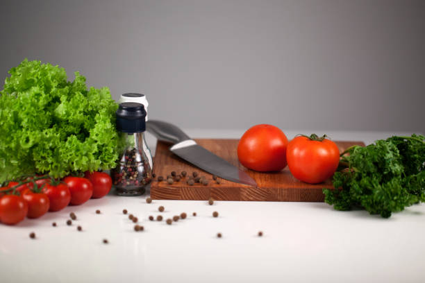 istock Close-up wooden cooking board with vegetable ingredients 640128400