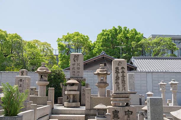 Japanese graveyard near Shitennoji temple, Osaka, Japan Osaka, Japan - April 26, 2016: Japanese graveyard near Shitennoji temple, Osaka, Japan shitenno ji stock pictures, royalty-free photos & images