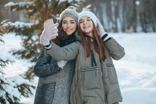 istock Two girls  do selfie 640132758