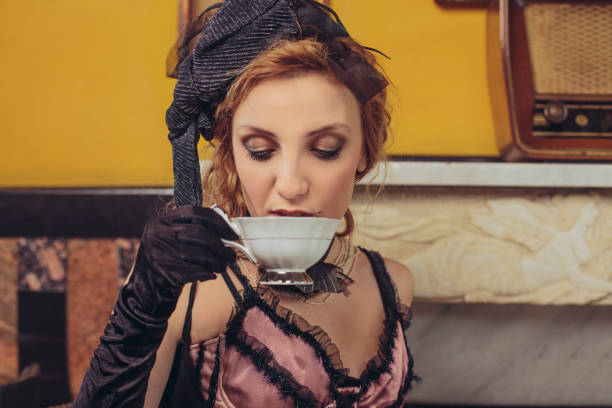 istock Tea time  Old fashioned young women  drinking tea  Retro party 640133076