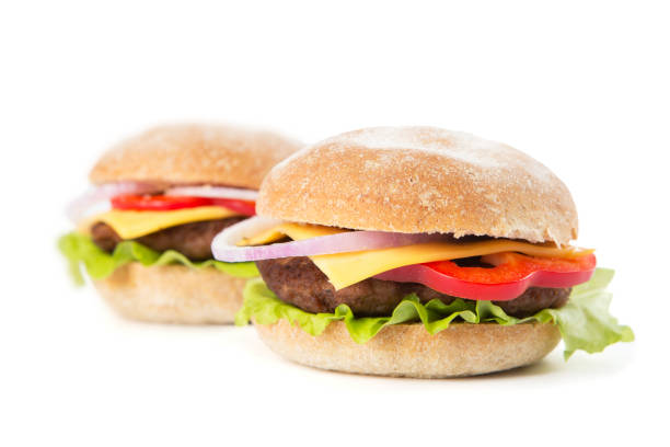 istock Two fresh burgers isolated on white background 640135610