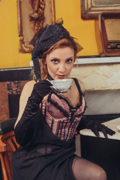 istock Tea time  Old fashioned young women  drinking tea  Retro party 640135696