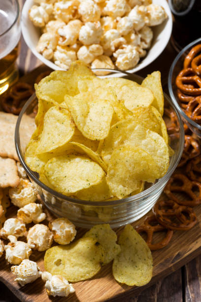 istock fast food, assortment of snacks for beer, vertical 640136482