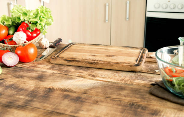 istock Kitchen table with the ingredients for cooking healthy food 640138708