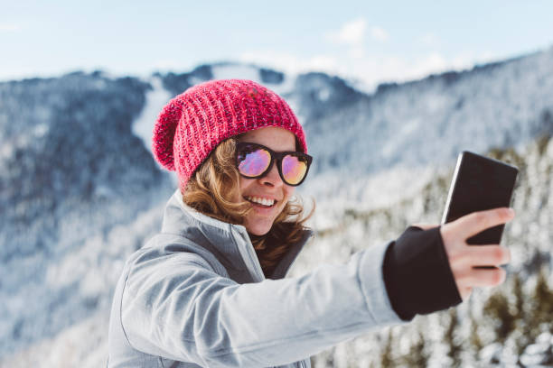 istock Beautiful girl taking a selfie on the mountain 640138986