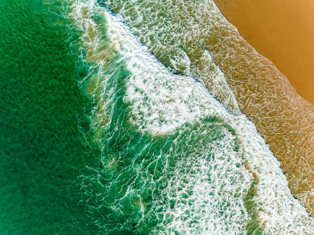 istock Aerial View Amazing Seascape with Small Waves on Sandy Beach 640139834