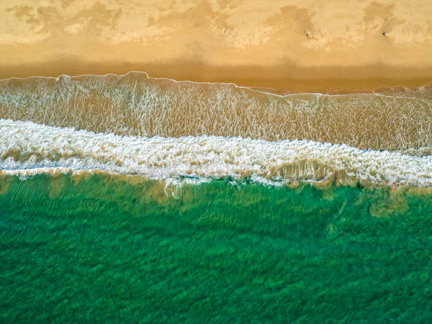istock Aerial View Amazing Seascape with Small Waves on Sandy Beach 640141314