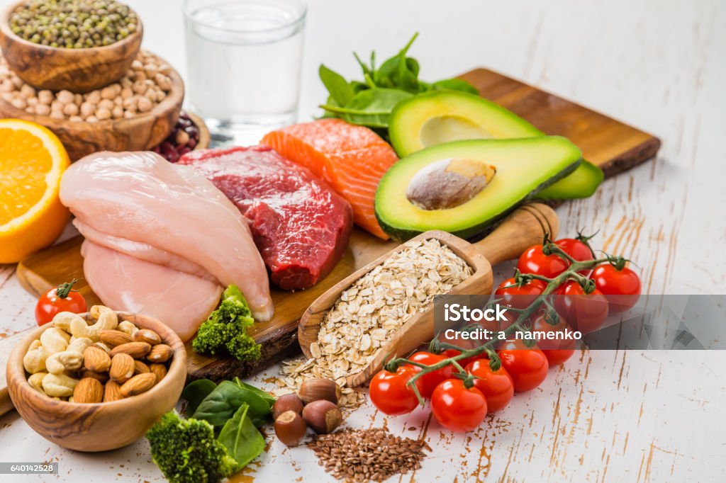 Selection of food that is good for the health and Selection of food that is good for the health and skin, rustic wood background Addiction Stock Photo