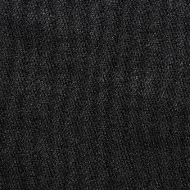 istock Black color t-shirt texture 640143378
