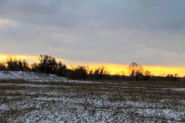 istock Sunset on the winter meadow 640143730
