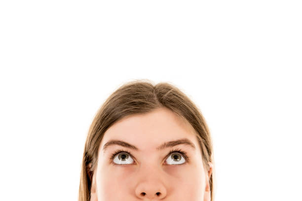 istock Young woman looking up 640144624