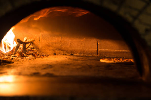 istock Pizza cooking in a tradition oven 640146086