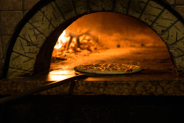 istock Pizza cooking in a tradition oven 640146936
