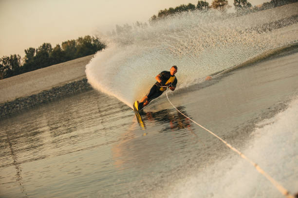 istock Man water skiing on lake 640147182