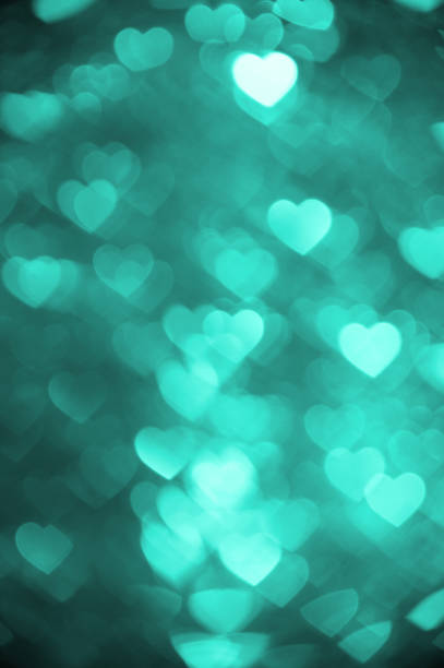 istock Heart background boke photo, dark green color. Abstract valentine backdrop. 640147552