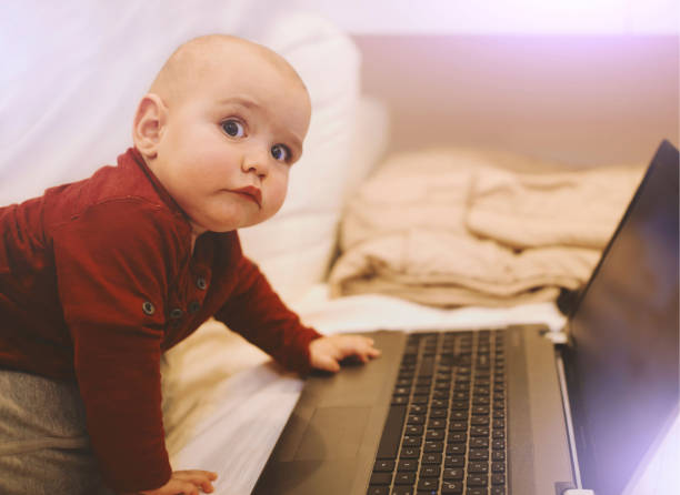 Baby Mit Computer 1,400+ Baby Computer On White Stock Photos, Pictures & Royalty-Free ...
