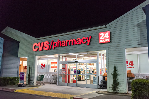 Davis, California, USA - June 9, 2016: Night Picture of a CVS Pharmacy Store in E Cowell Blv, Davis, CA. This CVS Pharmacy is open 24 hours a day for those who need over the counter medicine or prescriptions filled. CVS was founded in 5/8/1963 and is the second largest pharmacy chain in the USA with 7600 locations across the country.