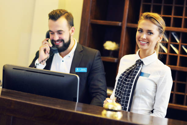 Reception Manager Men 29,100+ Male Receptionist Stock Photos, Pictures & Royalty-Free Images ...