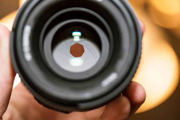istock macro of aperture hole in camera lens 640149850