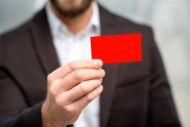 istock Man showing business card 640150116