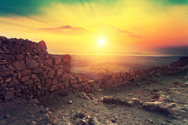 istock sunrise over Masada fortress 640150214