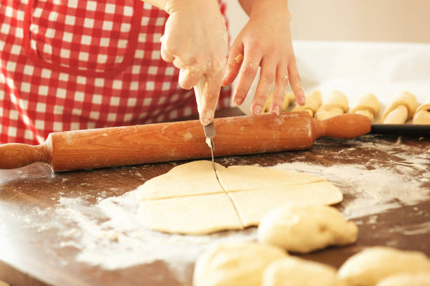istock Woman Working With Dough, Making Croissants. Close up. 640151726