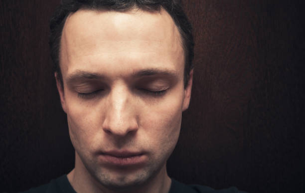 istock Young Caucasian man with closed eyes 640152646